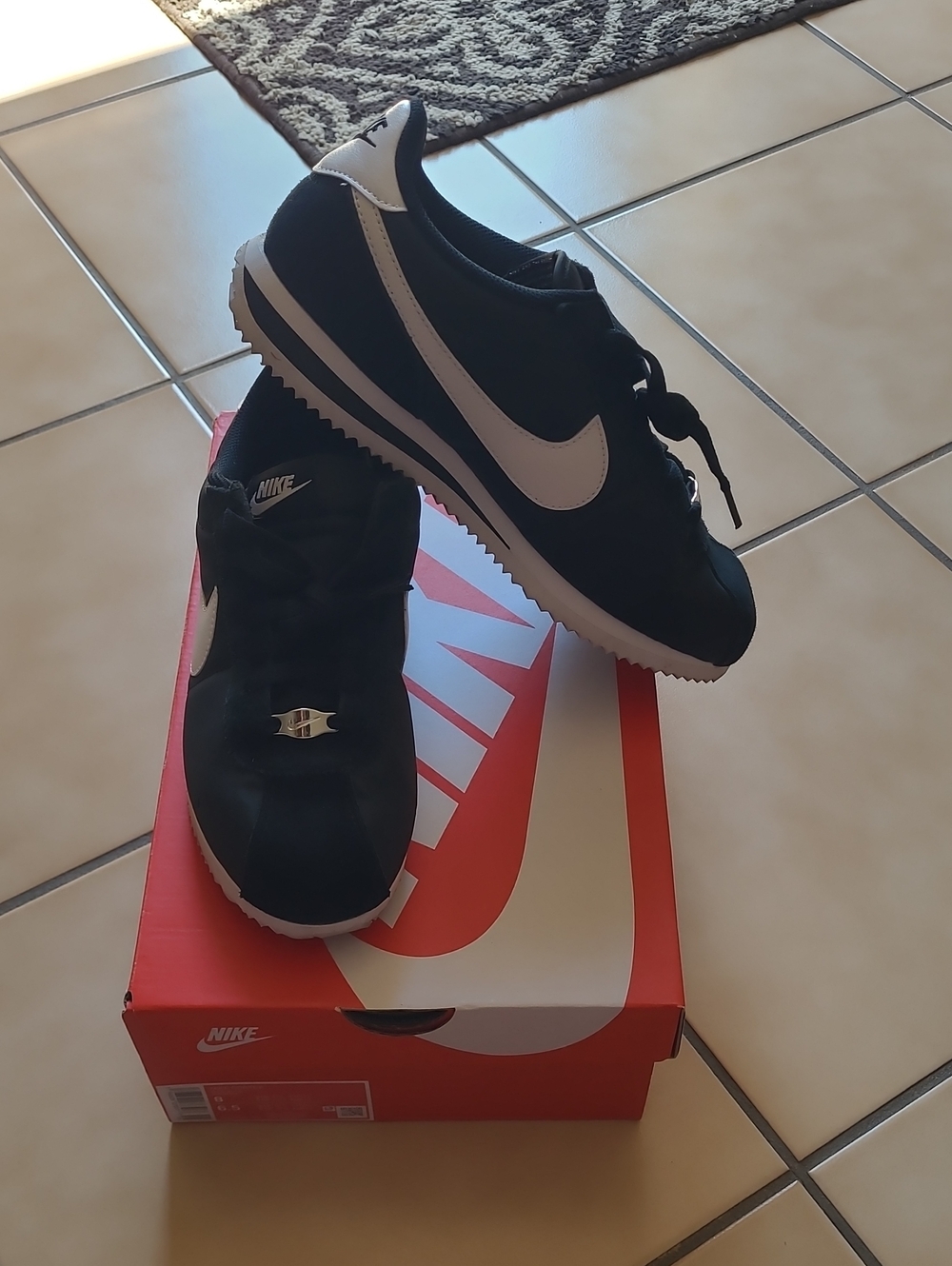 Nike Women’s Black and White Cortez Textile
